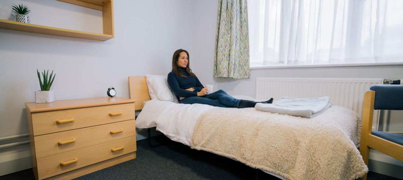 Keyworker relaxing in their Grantchester House bedroom